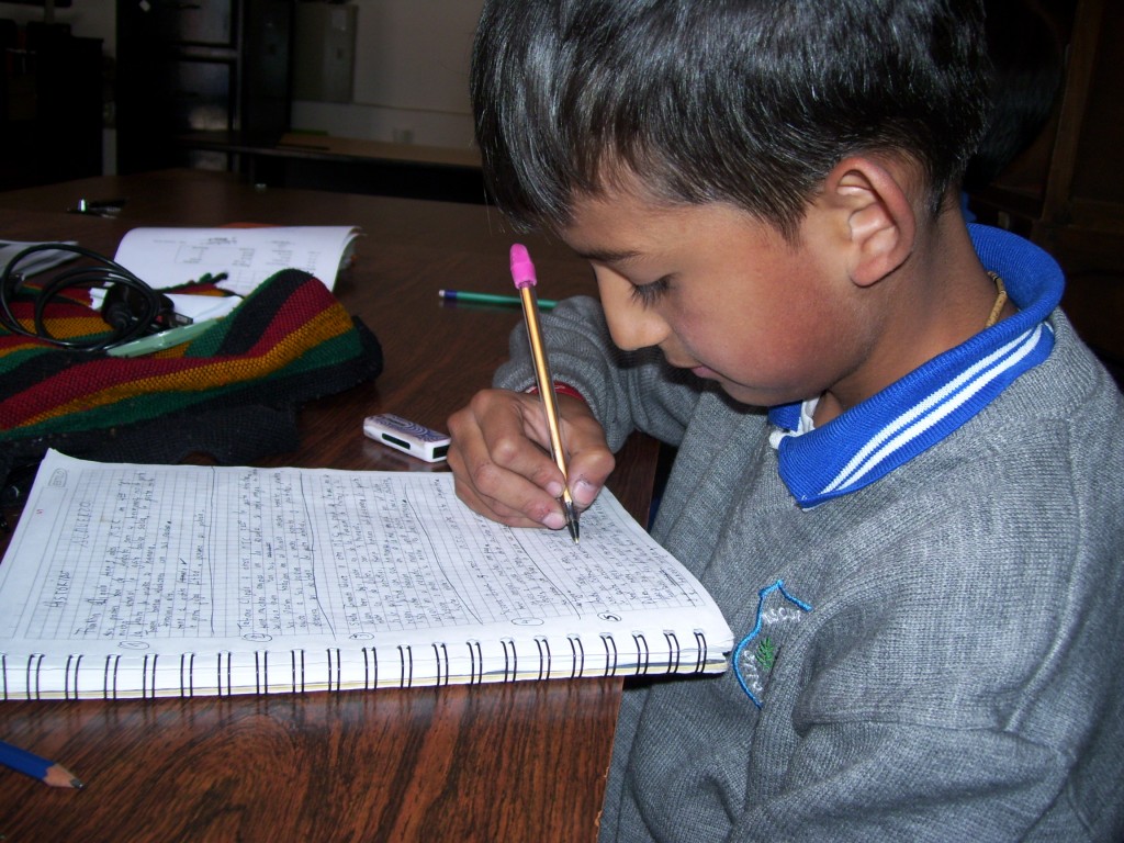 Leandro hard at work on his homework Leandro hard at work on his homework