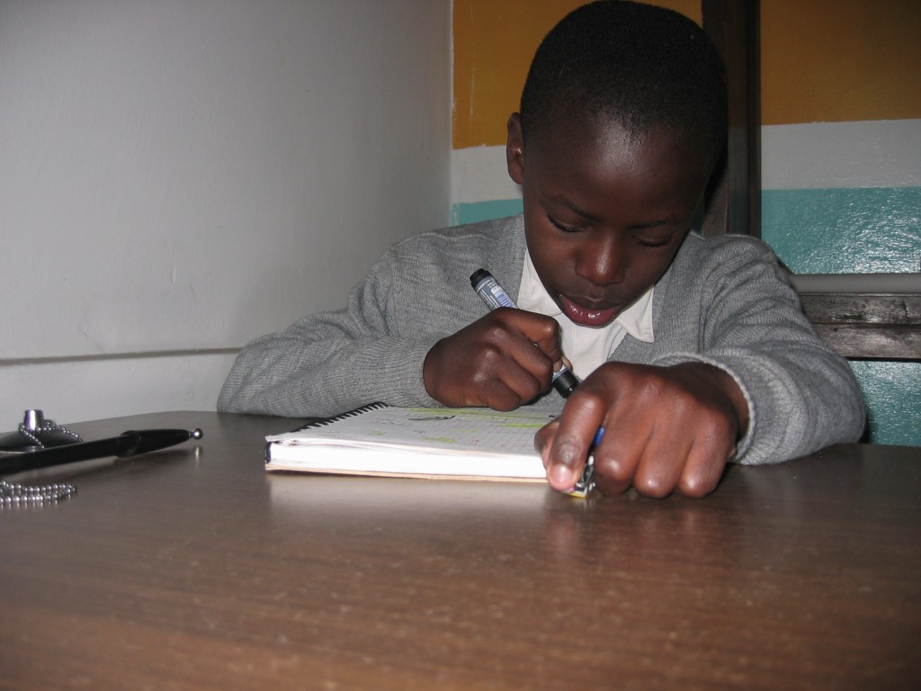 Mateo works hard at his homework